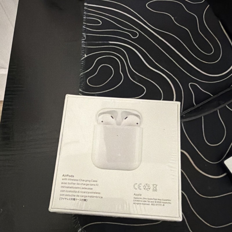Apple AirPods with Wireless Charging Case MRXJ2AM/A White Bluetooth Earbuds gallery