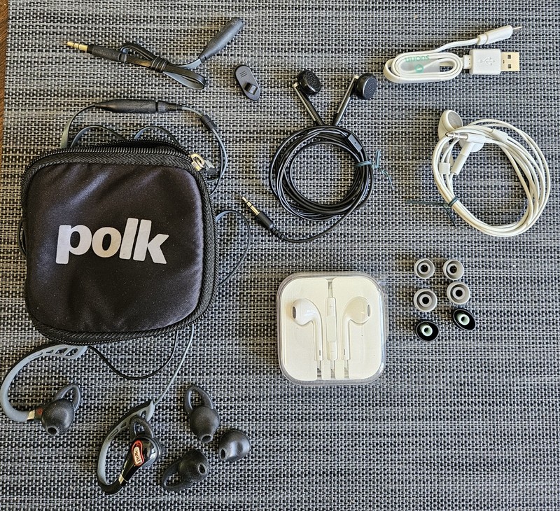 Four Sets of Earbuds w Jacks Different Sized Inserts. Two Apple, Polk, Creative